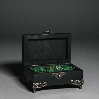 Dark romantic wedding ring holder with legs